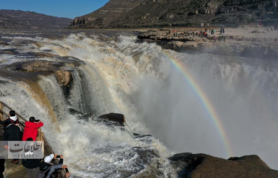 تصاویری جالب از جدال آبشار زرد با رنگین کمان + عکس