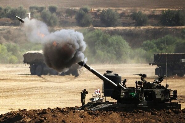 ببینید | عکس یادگاری با گلوله‌های توپخانه اسرائیل قبل از شلیک!