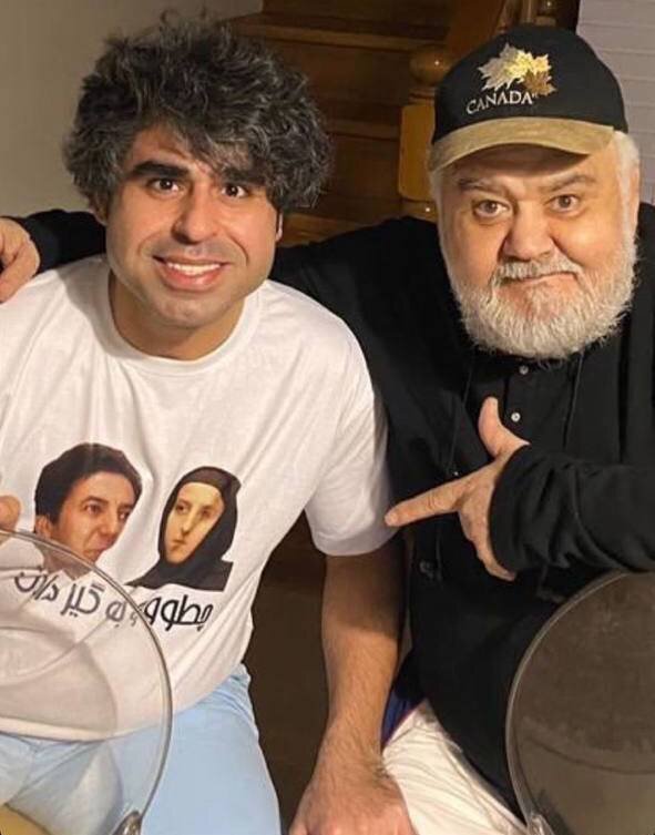 عکس | تیشرت عجیب امیر نوری با تصویر ویدیوی معروف ایرج ملکی در دیدار با اکبر عبدی!