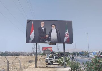 رئیس‌جمهور شهید ایران و بشار اسد در خیابان‌های دمشق