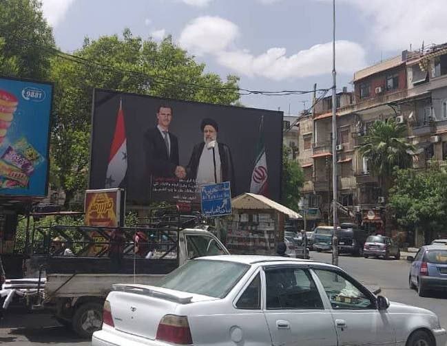 رئیس‌جمهور شهید ایران و بشار اسد در خیابان‌های دمشق