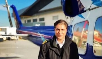 عکس| بی‌تابی‌های مادر خلبان بهروز قدیمی جلوی تابوت فرزندش