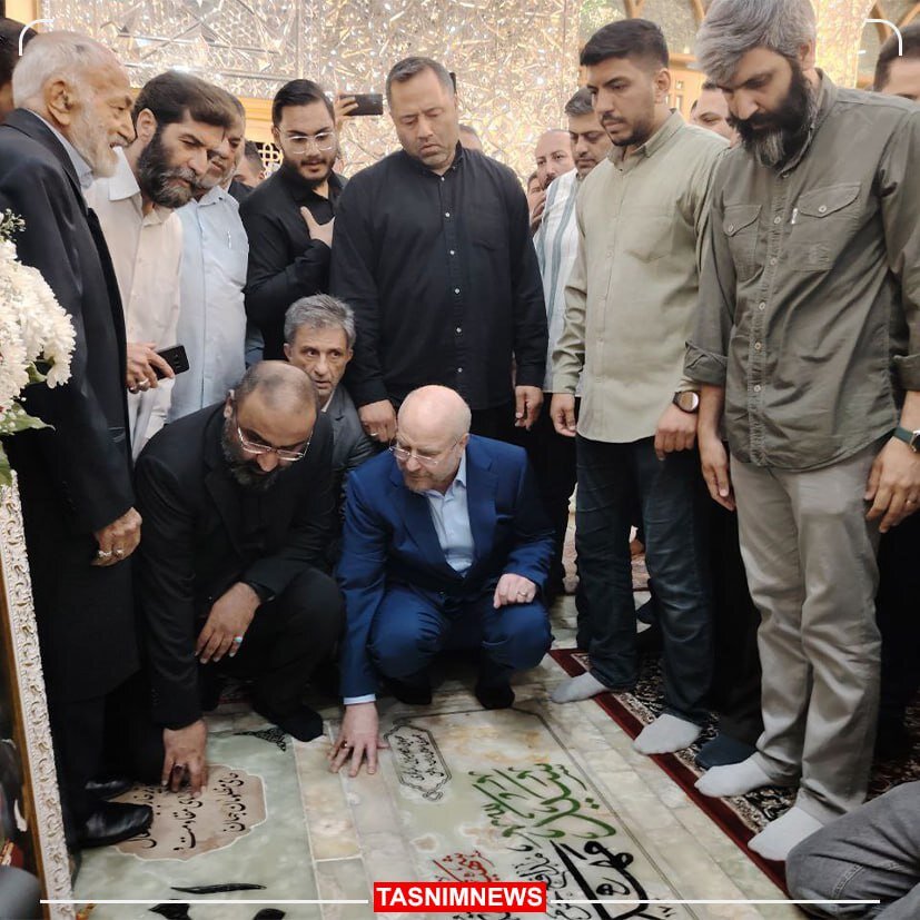 عکسی از فاتحه خوانی قالیباف بر مزار شهید امیرعبداللهیان