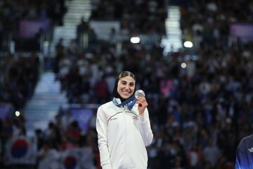 عکس | دختر تاریخساز ایران در مراسم ویژه کمیته ملی المپیک عکس | دختر تاریخساز ایران در مراسم ویژه کمیته ملی المپیک