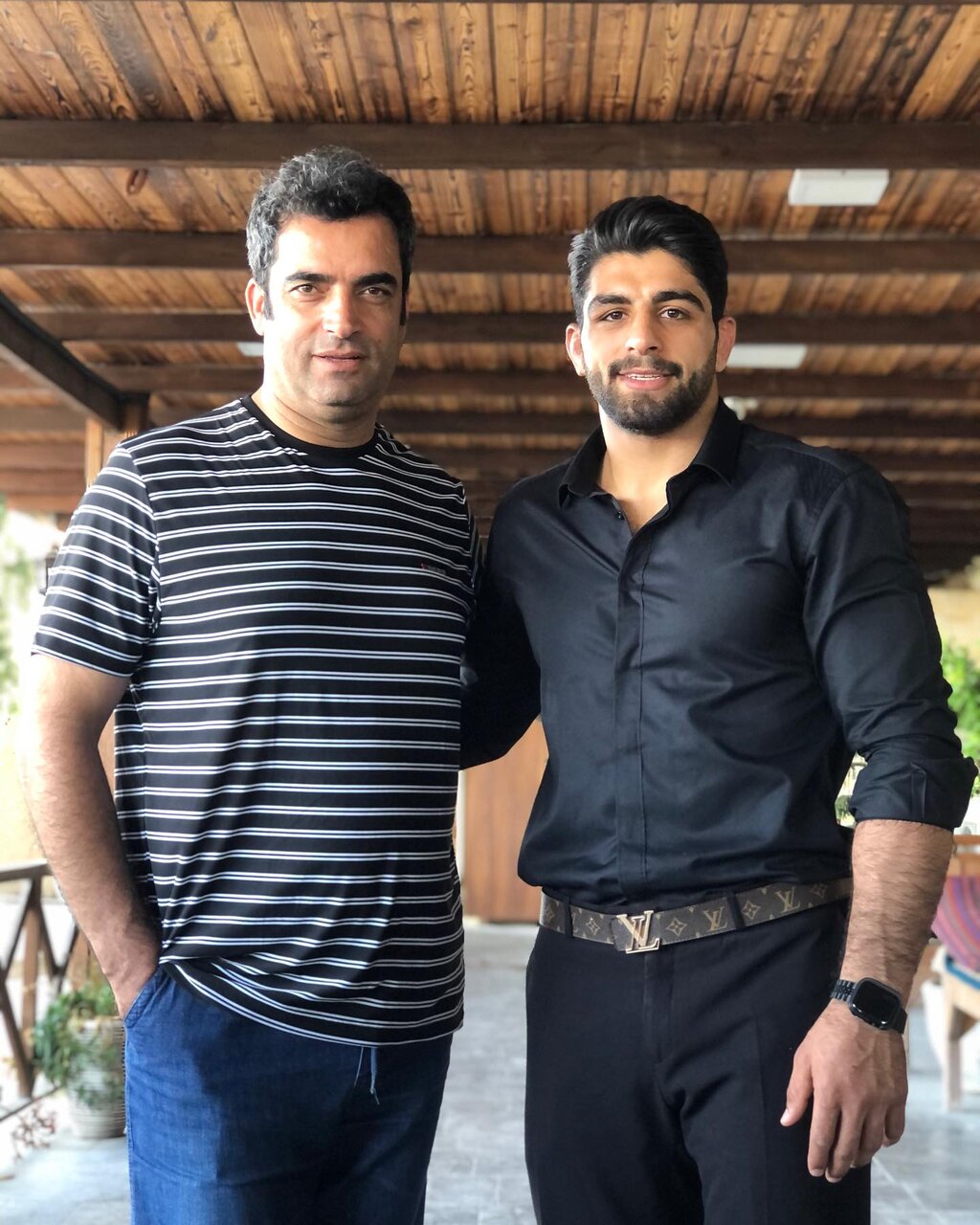 عکسهای صمیمی منوچهر هادی با قهرمان المپیک