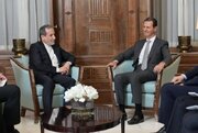 President Assad hosts Iran FM, says Syria determined to uproot terrorism