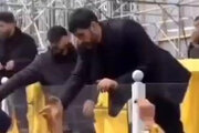 ببینید | واکنش محافظ سیدحسن نصرالله به دست مصنوعی یک جانباز حزب‌الله