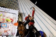 بانوی سوارکار کُرد با شعار صلح و امید آتش نوروز ۱۴۰۴ را روشن کرد
