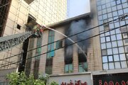 حریق در دفتر اسناد خیابان ستارخان؛ حضور زنان آتش‌نشان در عملیات/ عکس