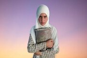دختر ناشنوای کشمیری کل قرآن را کتابت کرد