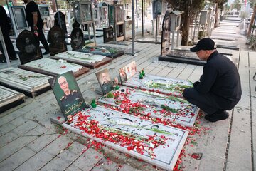 قالیباف بر مزار شهیدان باقری و حاجی زاده + عکس