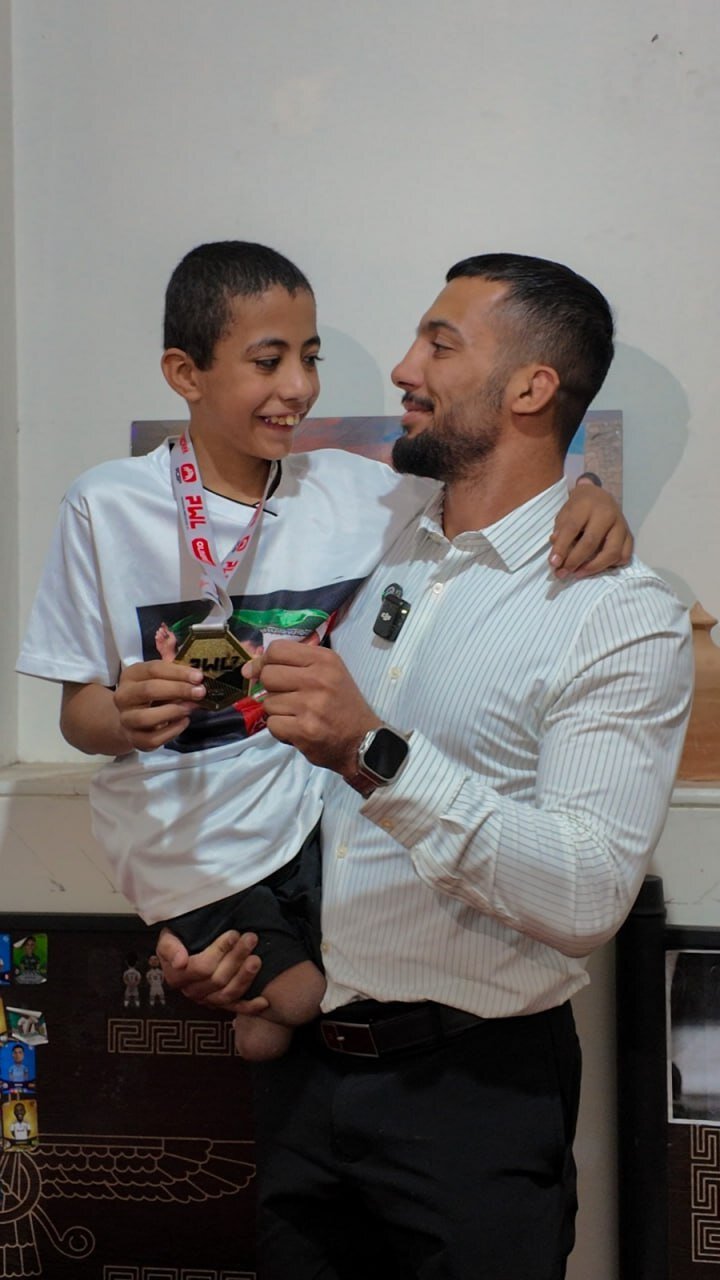 عکس | اقدام اخلاقی قهرمان ایرانی کشتی جهان و المپیک 2