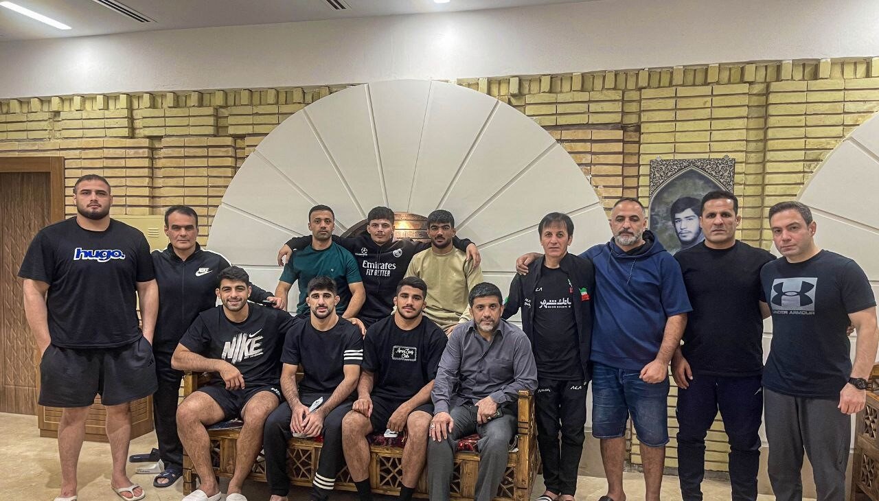 عکس| قهرمان المپیک در جمع قهرمانان دنیا: شما بهترین هستید