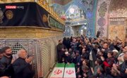 ببینید | طواف پیکر شهید دکتر لاریجانی و پسرش در حرم حضرت معصومه (س)