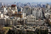 عکس/ «دو شتر و شتربان» در حال عبور از محله خانی‌آباد نو؛ سال ۵۶