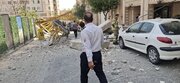 سقوط جرثقیل روی ساختمان مسکونی/ عکس