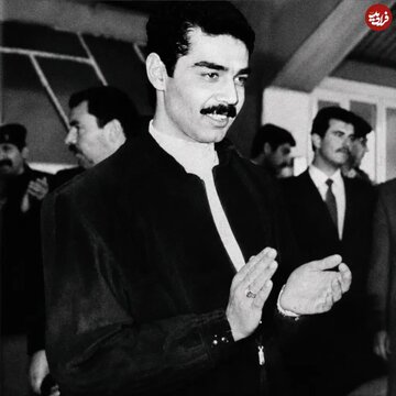 عدی، پسر صدام در حاشیه یک جلسه امنیتی؛ دهه ۷۰ / عکس